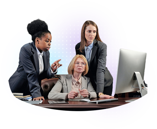 Three women executives reviewing financial documents to ensure accessibility compliance and prevent legal risks